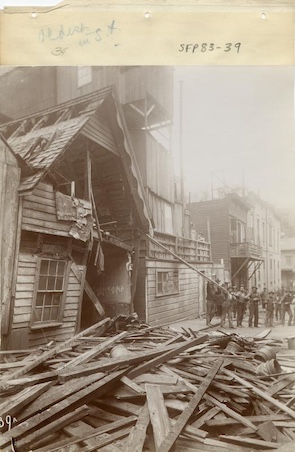 Pulling down building Chinatown demolition.jpg